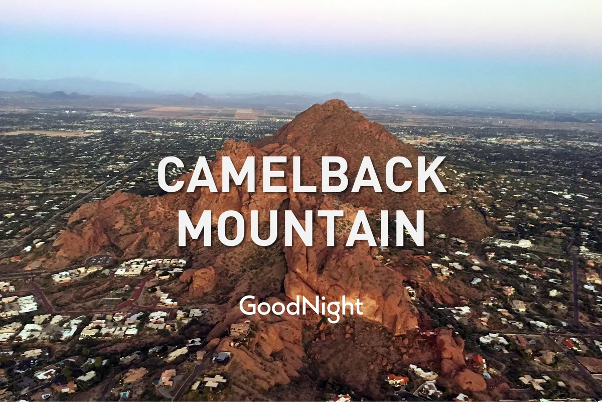This view captures Camelback Mountain at sunset, with the gentle gradient of the sky illuminating the famous silhouette, the cityscape below, and hints of desert foliage. The vantage point evokes the outdoor adventure and romantic moments alluded to in the section.